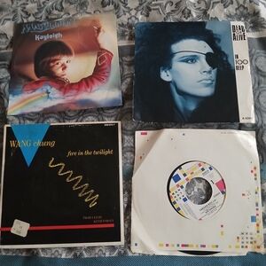 4 45s Vinyl Record Collection with Colorful Covers